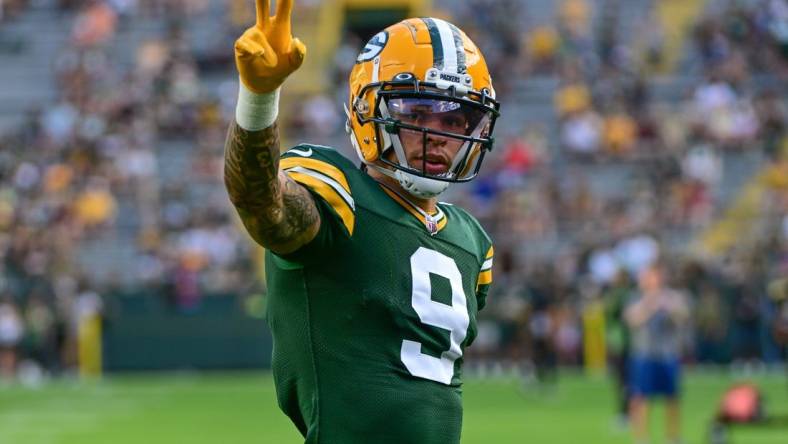 Aug 19, 2023; Green Bay, Wisconsin, USA; Green Bay Packers wide receiver Christian Watson (9) waves to fans before game against the New England Patriots at Lambeau Field. Mandatory Credit: Benny Sieu-USA TODAY Sports