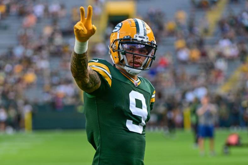 Aug 19, 2023; Green Bay, Wisconsin, USA; Green Bay Packers wide receiver Christian Watson (9) waves to fans before game against the New England Patriots at Lambeau Field. Mandatory Credit: Benny Sieu-USA TODAY Sports