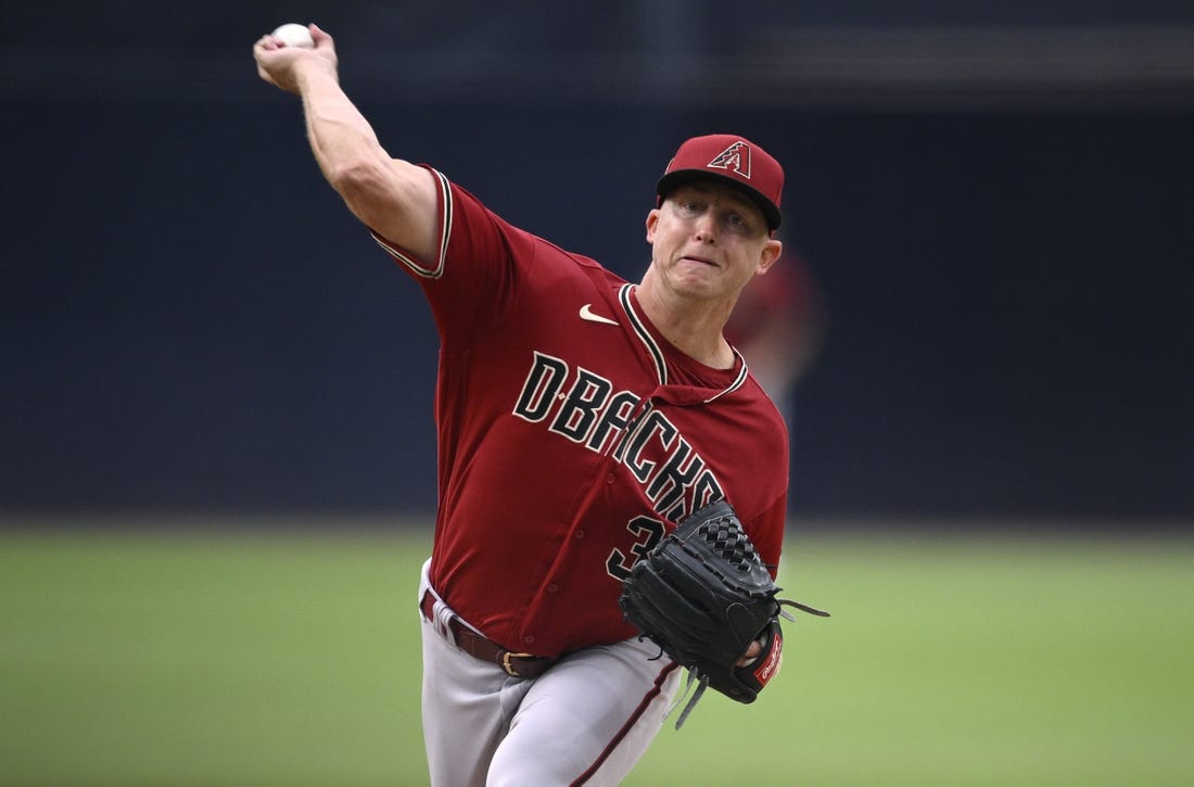 Aug 19, 2023; San Diego, California, USA; Arizona Diamondbacks starting pitcher Scott McGough (30) throws a pitch against the San Diego Padres during the first inning at Petco Park. Mandatory Credit: Orlando Ramirez-USA TODAY Sports