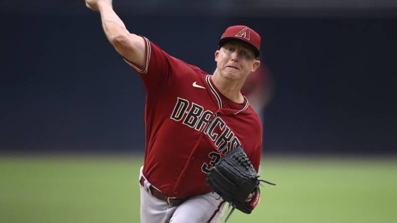 Aug 19, 2023; San Diego, California, USA; Arizona Diamondbacks starting pitcher Scott McGough (30) throws a pitch against the San Diego Padres during the first inning at Petco Park. Mandatory Credit: Orlando Ramirez-USA TODAY Sports