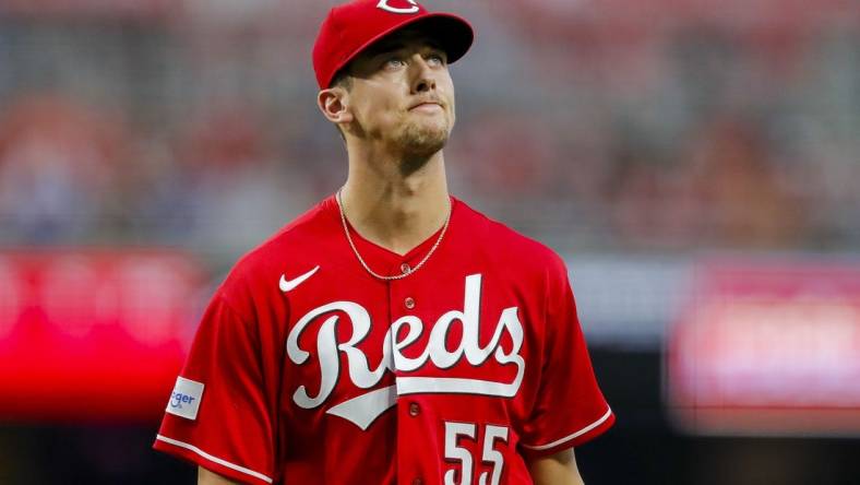 Aug 19, 2023; Cincinnati, Ohio, USA; Cincinnati Reds starting pitcher Brandon Williamson (55) walks off the field during a pitching change in the sixth inning against the Toronto Blue Jays at Great American Ball Park. Mandatory Credit: Katie Stratman-USA TODAY Sports