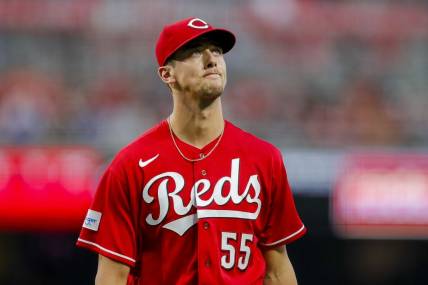 Aug 19, 2023; Cincinnati, Ohio, USA; Cincinnati Reds starting pitcher Brandon Williamson (55) walks off the field during a pitching change in the sixth inning against the Toronto Blue Jays at Great American Ball Park. Mandatory Credit: Katie Stratman-USA TODAY Sports