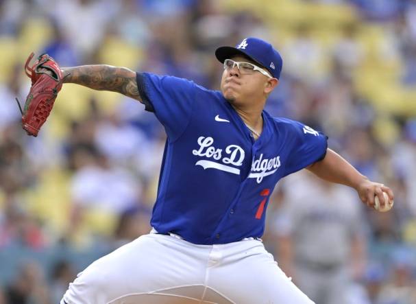 Aug 19, 2023; Los Angeles, California, USA;  Los Angeles Dodgers starting pitcher Julio Urias (7) throws to the plate in the first inning against the Miami Marlins at Dodger Stadium. Mandatory Credit: Jayne Kamin-Oncea-USA TODAY Sports