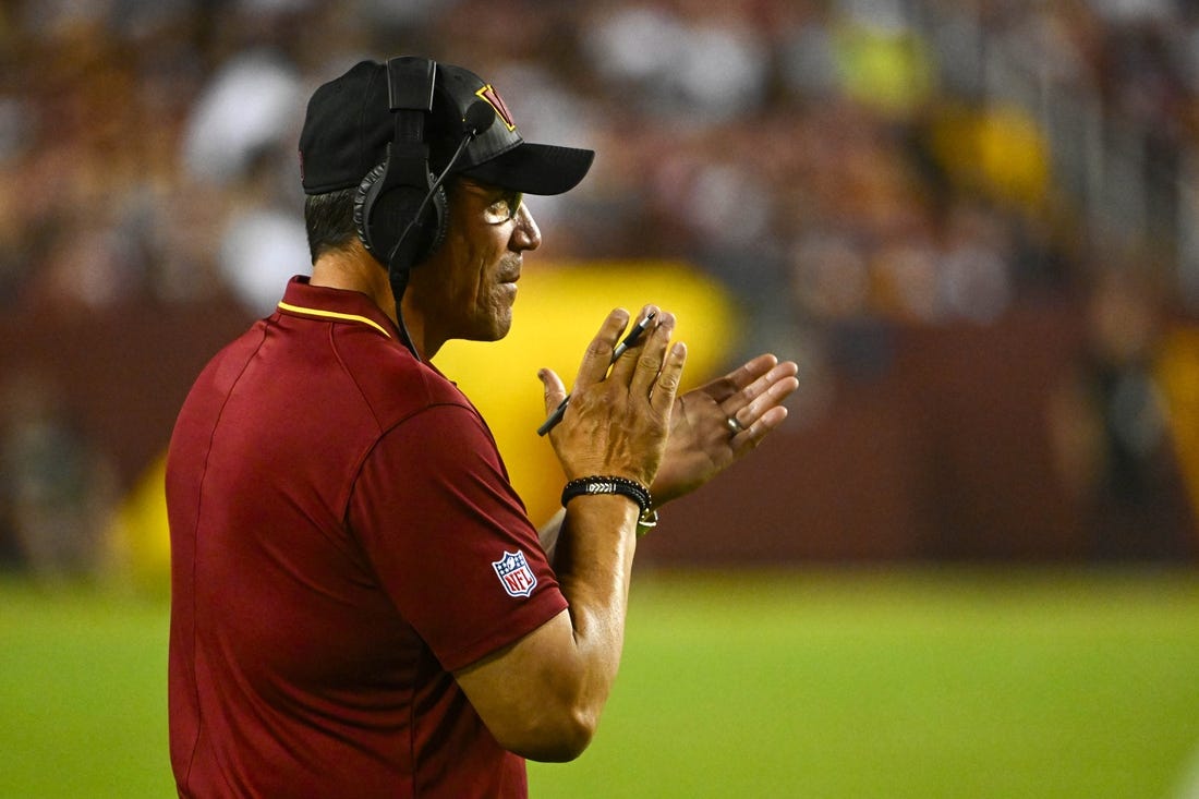 Aug 21, 2023; Landover, Maryland, USA; Washington Commanders head coach Ron Rivera on the field against the Baltimore Ravens during the first half at FedExField. Mandatory Credit: Brad Mills-USA TODAY Sports