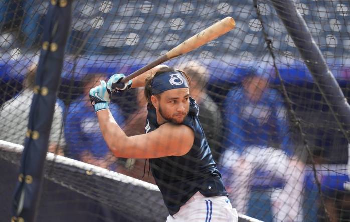 Aug 25, 2023; Toronto, Ontario, CAN; Toronto Blue Jays shortstop Bo Bichette (11) takes batting practice before a game against the Cleveland Guardians at Rogers Centre. Mandatory Credit: Nick Turchiaro-USA TODAY Sports