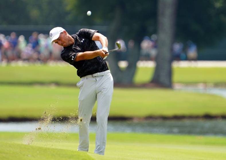 Jordan Spieth plays his shot on the on the eighth hole during the second round of the TOUR Championship golf tournament at East Lake Golf Club. Mandatory Credit: John David Mercer-USA TODAY Sports