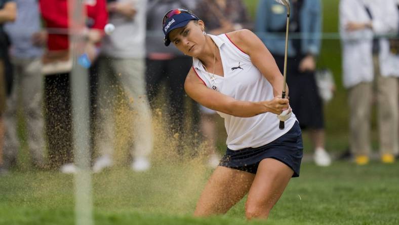 Aug 25, 2023; Vancouver, British Columbia, CAN; Lexi Thompson hits out of the bunker on the eighth hole during the second round of the CPKC Women's Open golf tournament at Shaughnessy Golf & Country Club. Mandatory Credit: Bob Frid-USA TODAY Sports