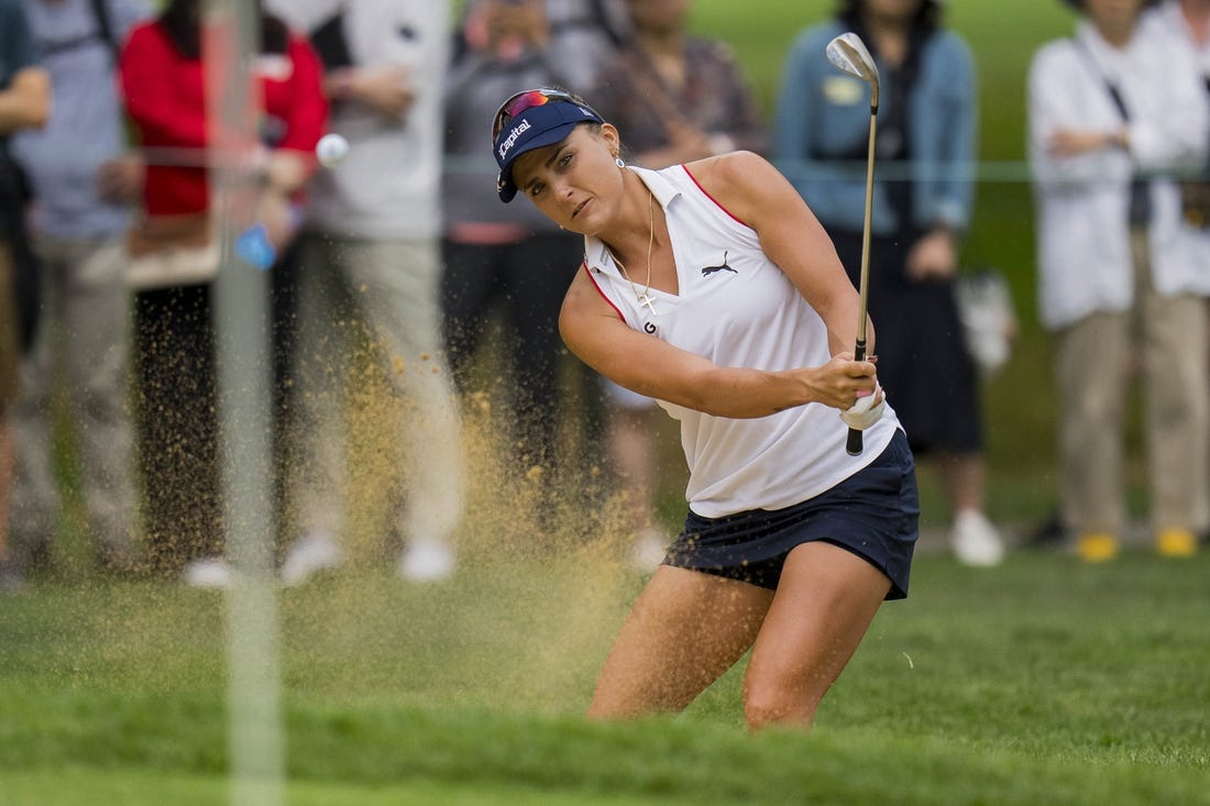 Aug 25, 2023; Vancouver, British Columbia, CAN; Lexi Thompson hits out of the bunker on the eighth hole during the second round of the CPKC Women's Open golf tournament at Shaughnessy Golf & Country Club. Mandatory Credit: Bob Frid-USA TODAY Sports