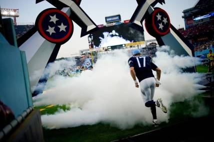 Aug 25, 2023; Nashville, Tennessee, USA; Tennessee Titans quarterback Ryan Tannehill (17) runs on to the field to play the New England Patriots at Nissan Stadium. Mandatory Credit: Andrew Nelles-USA TODAY Sports