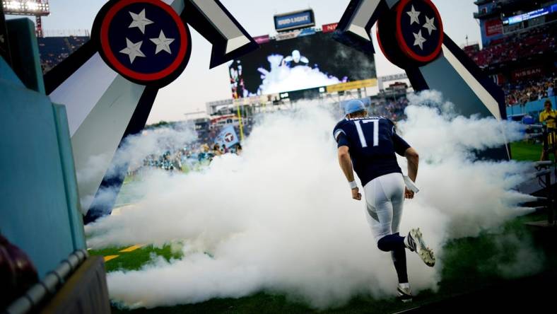 Aug 25, 2023; Nashville, Tennessee, USA; Tennessee Titans quarterback Ryan Tannehill (17) runs on to the field to play the New England Patriots at Nissan Stadium. Mandatory Credit: Andrew Nelles-USA TODAY Sports