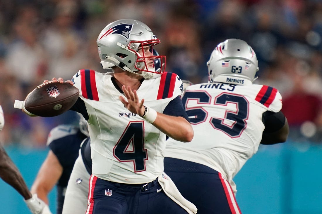 Aug 25, 2023; Nashville, Tennessee, USA; New England Patriots quarterback Bailey Zappe (4) throws a pass during the third quarter against the Tennessee Titans at Nissan Stadium. Mandatory Credit: Andrew Nelles-USA TODAY Sports