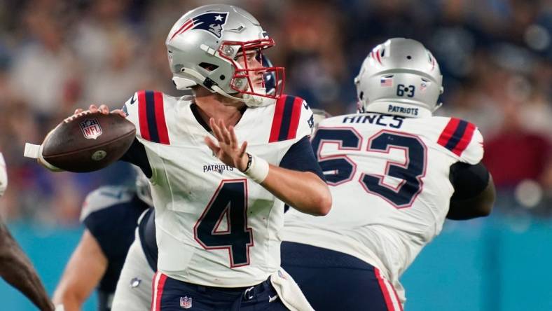 Aug 25, 2023; Nashville, Tennessee, USA; New England Patriots quarterback Bailey Zappe (4) throws a pass during the third quarter against the Tennessee Titans at Nissan Stadium. Mandatory Credit: Andrew Nelles-USA TODAY Sports