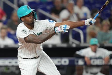 Aug 25, 2023; Miami, Florida, USA; Miami Marlins designated hitter Jorge Soler (12) strikes out in the fourth inning against the Washington Nationals at loanDepot Park. Mandatory Credit: Jim Rassol-USA TODAY Sports