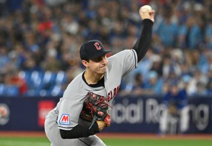 Aug 26, 2023; Toronto, Ontario, CAN; Cleveland Guardians starting pitcher Logan Allen (41) delivers against the Toronto Blue Jays in the first inning at Rogers Centre. Mandatory Credit: Dan Hamilton-USA TODAY Sports