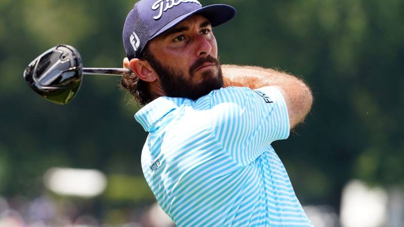 Aug 26, 2023; Atlanta, Georgia, USA; Max Homa plays his shot from the fourth tee during the third round of the TOUR Championship golf tournament at East Lake Golf Club. Mandatory Credit: John David Mercer-USA TODAY Sports