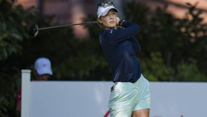 Aug 26, 2023; Vancouver, British Columbia, CAN; Nelly Korda tees off on the fourth hole during the third round of the CPKC Women's Open golf tournament at Shaughnessy Golf & Country Club. Mandatory Credit: Bob Frid-USA TODAY Sports