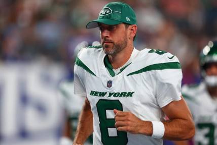 Aug 26, 2023; East Rutherford, New Jersey, USA; New York Jets quarterback Aaron Rodgers (8) leaves the field after the first half of their game against the New York Giants at MetLife Stadium. Mandatory Credit: Ed Mulholland-USA TODAY Sports