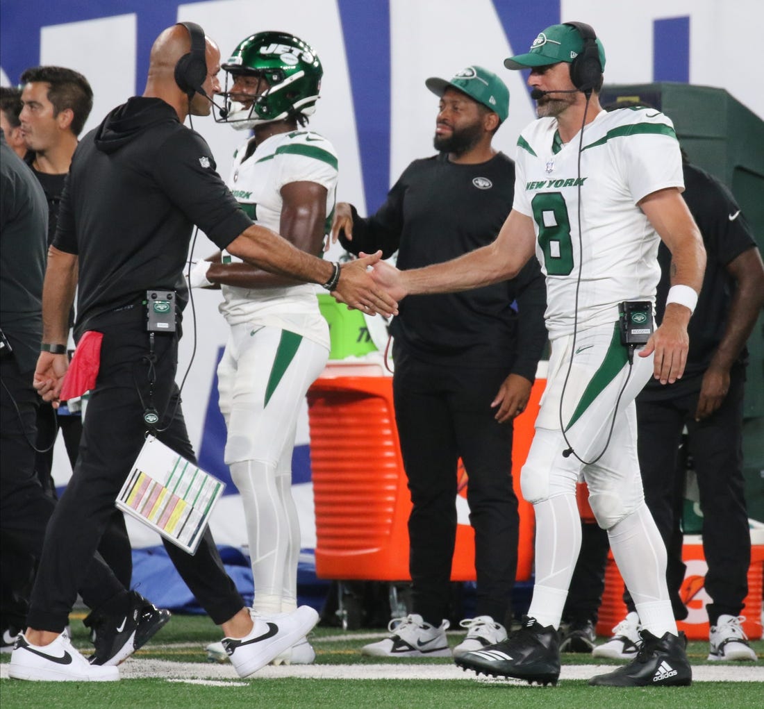 East Rutherford, NJ August 26, 2023 -- bCoach Robert Saleh and Aaron Rodgers celebrates after the third offensive unit scored a fourth quarter TD. The NY Jets against the NY Giants on August 26, 2023 at MetLife Stadium in East Rutherford, NJ, as the rivals play their final preseason game before the start of the NFL season.