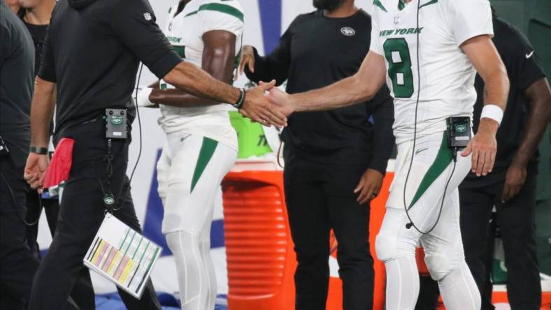 East Rutherford, NJ August 26, 2023 -- bCoach Robert Saleh and Aaron Rodgers celebrates after the third offensive unit scored a fourth quarter TD. The NY Jets against the NY Giants on August 26, 2023 at MetLife Stadium in East Rutherford, NJ, as the rivals play their final preseason game before the start of the NFL season.