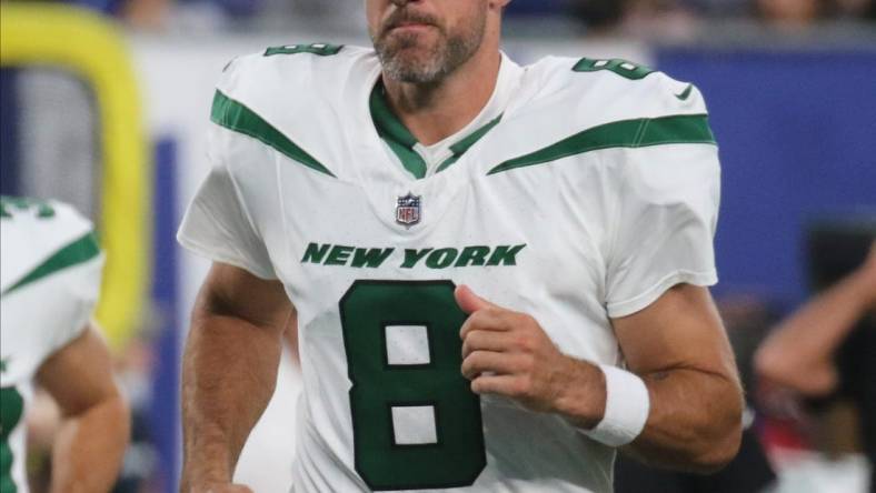 East Rutherford, NJ August 26, 2023 -- Jets quarterback Aaron Rodgers at the end of the first half. The NY Jets against the NY Giants on August 26, 2023 at MetLife Stadium in East Rutherford, NJ, as the rivals play their final preseason game before the start of the NFL season.