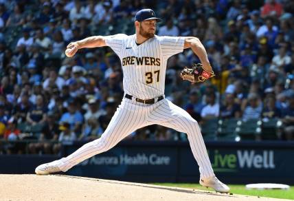 Aug 27, 2023; Milwaukee, Wisconsin, USA; Milwaukee Brewers starting pitcher Adrian Houser (37) delivers a pitch against the San Diego Padres in the first inning at American Family Field. Mandatory Credit: Michael McLoone-USA TODAY Sports