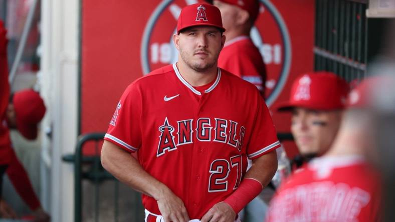 Aug 22, 2023; Anaheim, California, USA;  Los Angeles Angels center fielder Mike Trout (27) in the dugout before the game against the Cincinnati Reds at Angel Stadium. Mandatory Credit: Kiyoshi Mio-USA TODAY Sports