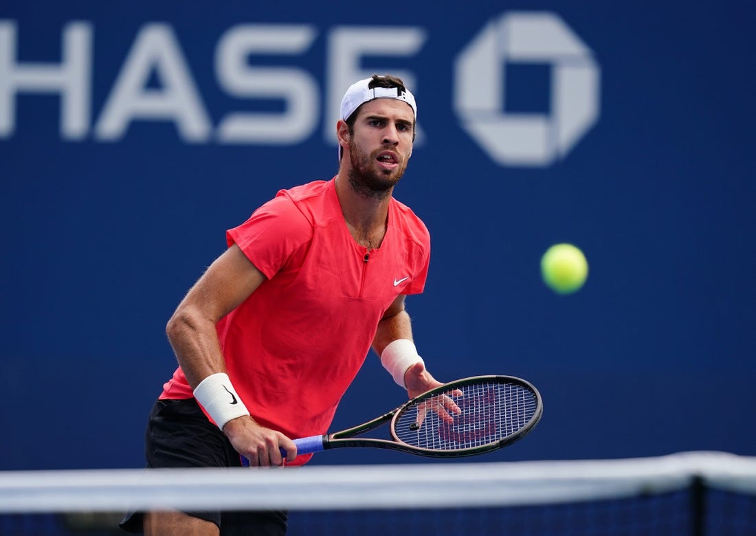 Aug 29, 2023; Flushing, NY, USA; Karen Khachanov in action against Michael Mmoh of the United States on day two of the 2023 U.S. Open tennis tournament at the USTA Billie Jean King National Tennis Center. Mandatory Credit: Jerry Lai-USA TODAY Sports