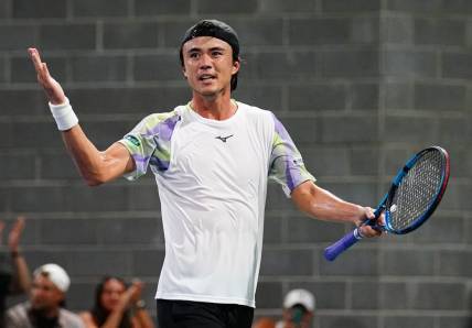 Aug 29, 2023; Flushing, NY, USA; Taro Daniel of Japan celebrates after winning a point against Gael Monfils of France on day two of the 2023 U.S. Open tennis tournament at the USTA Billie Jean King National Tennis Center. Mandatory Credit: Jerry Lai-USA TODAY Sports