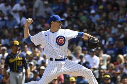 Aug 30, 2023; Chicago, Illinois, USA; Chicago Cubs starting pitcher Kyle Hendricks (28) delivers  against the Milwaukee Brewers during the second inning at Wrigley Field. Mandatory Credit: Matt Marton-USA TODAY Sports