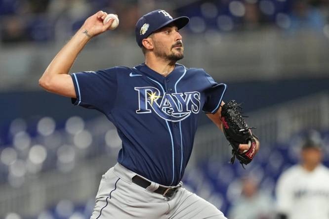 Aug 30, 2023; Miami, Florida, USA; Tampa Bay Rays starting pitcher Zach Eflin (24) pitches against the Miami Marlins in the first inning at loanDepot Park. Mandatory Credit: Jim Rassol-USA TODAY Sports