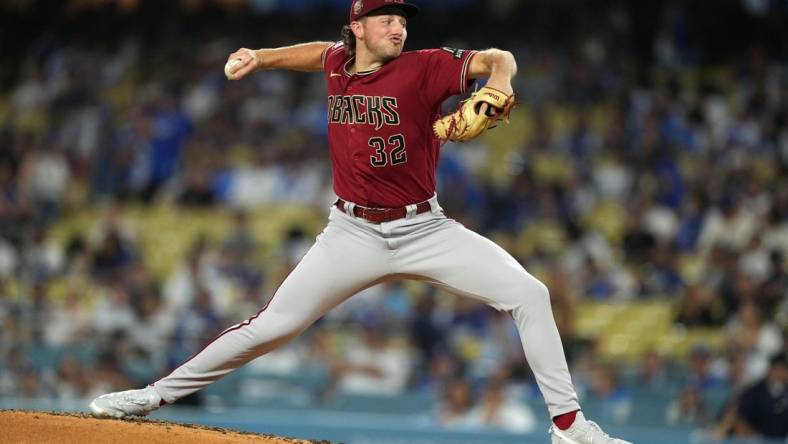 Aug 29, 2023; Los Angeles, California, USA; Arizona Diamondbacks starting pitcher Brandon Pfaadt (32) throws in the second inning against the Los Angeles Dodgers at Dodger Stadium. Mandatory Credit: Kirby Lee-USA TODAY Sports