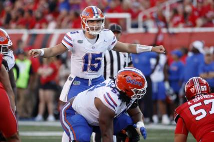 Aug 31, 2023; Salt Lake City, Utah, USA; Florida Gators quarterback Graham Mertz (15) works the line of scrimmage against the Utah Utes at Rice-Eccles Stadium. Mandatory Credit: Jeff Swinger-USA TODAY Sports