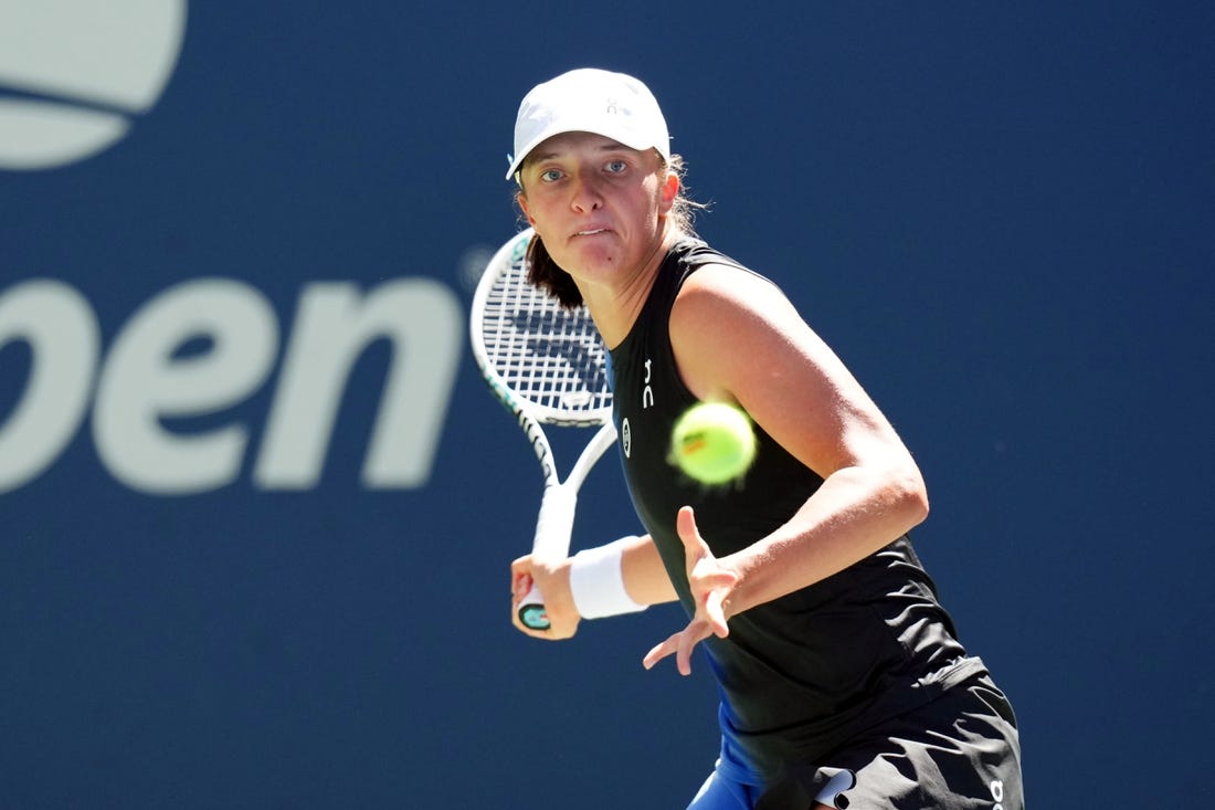 Sep 1, 2023; Flushing, NY, USA; Iga Swiatek of Poland hits to Kaja Juvan of Slovenia on day five of the 2023 U.S. Open tennis tournament at USTA Billie Jean King National Tennis Center. Mandatory Credit: Danielle Parhizkaran-USA TODAY Sports