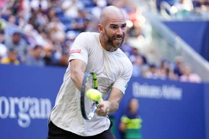 Sep 1, 2023; Flushing, NY, USA; Adrian Mannarino of France hits to Frances Tiafoe of the United States on day five of the 2023 U.S. Open tennis tournament at USTA Billie Jean King National Tennis Center. Mandatory Credit: Danielle Parhizkaran-USA TODAY Sports