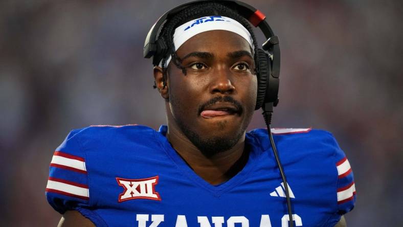 Sep 1, 2023; Lawrence, Kansas, USA; Kansas Jayhawks quarterback Jalon Daniels (6) during a timeout in the first half against the Missouri State Bears at David Booth Kansas Memorial Stadium. Mandatory Credit: Jay Biggerstaff-USA TODAY Sports