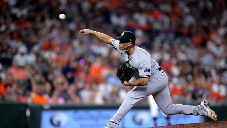 Sep 1, 2023; Houston, Texas, USA; New York Yankees relief pitcher Jonathan Loaisiga (43) delivers a pitch against the Houston Astros during the ninth inning at Minute Maid Park. Mandatory Credit: Erik Williams-USA TODAY Sports