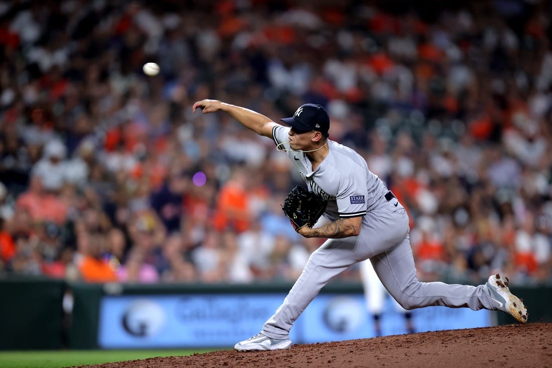 Sep 1, 2023; Houston, Texas, USA; New York Yankees relief pitcher Jonathan Loaisiga (43) delivers a pitch against the Houston Astros during the ninth inning at Minute Maid Park. Mandatory Credit: Erik Williams-USA TODAY Sports