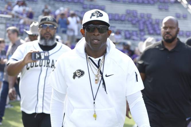 Sep 2, 2023; Fort Worth, Texas, USA; Colorado Buffaloes head coach Deon Sanders walks on the field before the game against the TCU Horned Frogs at Amon G. Carter Stadium. Mandatory Credit: Tim Heitman-USA TODAY Sports