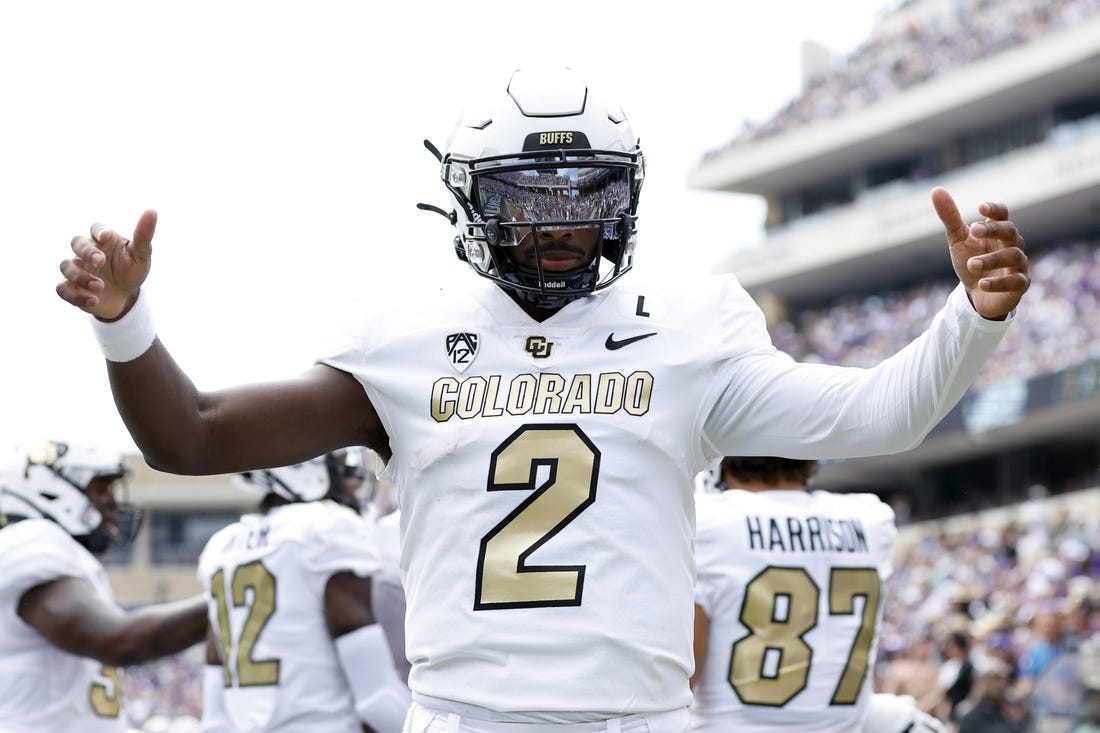 Sep 2, 2023; Fort Worth, Texas, USA; Colorado Buffaloes quarterback Shedeur Sanders (2) celebrates a touchdown in the first quarter against the TCU Horned Frogs at Amon G. Carter Stadium. Mandatory Credit: Tim Heitman-USA TODAY Sports