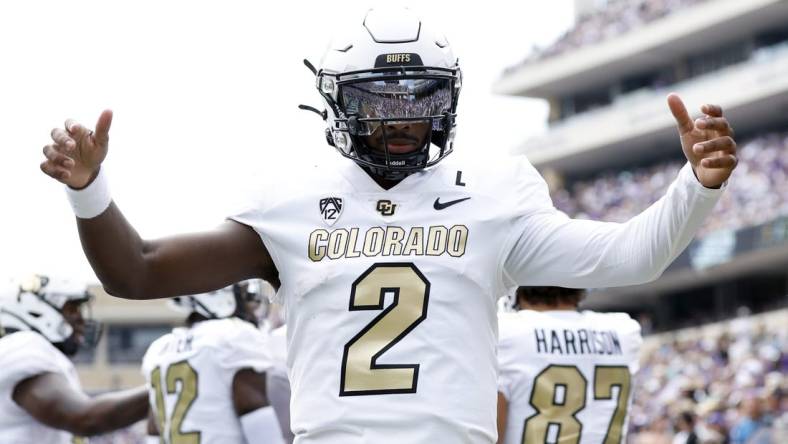 Sep 2, 2023; Fort Worth, Texas, USA; Colorado Buffaloes quarterback Shedeur Sanders (2) celebrates a touchdown in the first quarter against the TCU Horned Frogs at Amon G. Carter Stadium. Mandatory Credit: Tim Heitman-USA TODAY Sports