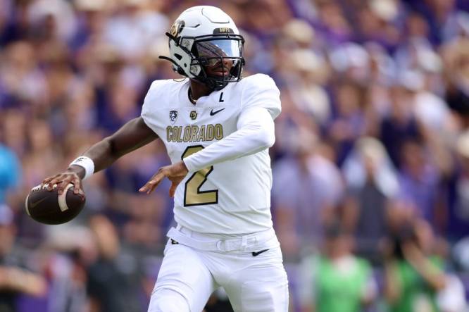 Sep 2, 2023; Fort Worth, Texas, USA; Colorado Buffaloes quarterback Shedeur Sanders (2) rolls out to pass in the second quarter against the TCU Horned Frogs at Amon G. Carter Stadium. Mandatory Credit: Tim Heitman-USA TODAY Sports
