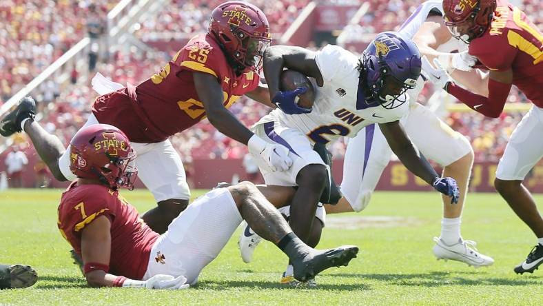 Iowa State Cyclones' defensive back Trevon Howard (25)takes down Northern Iowa Panthers running back Tye Edwards (2) during the first quarter in the season-opening game at Jack Trice Stadium on Saturday, Sept. 2, 2023, in Ames, Iowa.