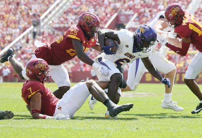 Iowa State Cyclones' defensive back Trevon Howard (25)takes down Northern Iowa Panthers running back Tye Edwards (2) during the first quarter in the season-opening game at Jack Trice Stadium on Saturday, Sept. 2, 2023, in Ames, Iowa.