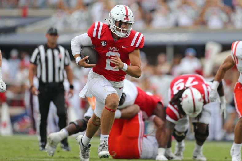 Sep 2, 2023; Oxford, Mississippi, USA; Mississippi Rebels quarterback Jaxson Dart (2) runs the ball during the first half against the Mercer Bears at Vaught-Hemingway Stadium. Mandatory Credit: Petre Thomas-USA TODAY Sports