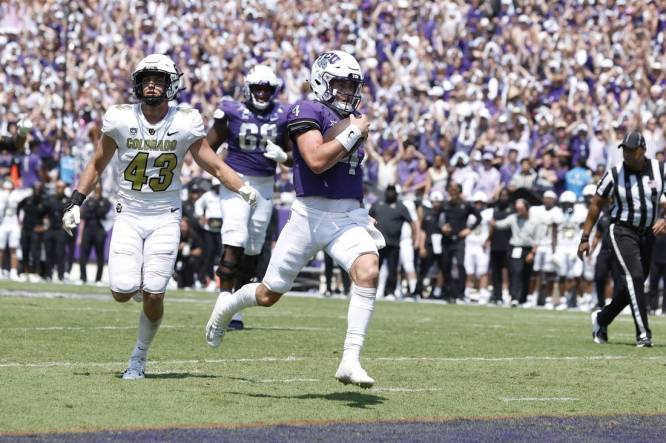 Sep 2, 2023; Fort Worth, Texas, USA; TCU Horned Frogs quarterback Chandler Morris (4) scores a touchdown in the fourth quarter against the Colorado Buffaloes at Amon G. Carter Stadium. Mandatory Credit: Tim Heitman-USA TODAY Sports