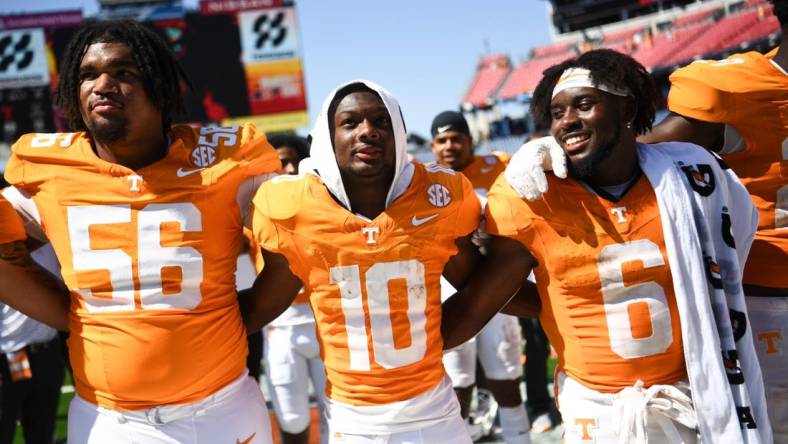 Tennessee offensive lineman Mo Clipper Jr. (56) Tennessee wide receiver Squirrel White (10) and Tennessee running back Dylan Sampson (6) after a game between Tennessee and Virginia in Nissan Stadium in Nashville, Tenn., Saturday, Sept. 2, 2023. Tennessee defeated Virginia 49-13.