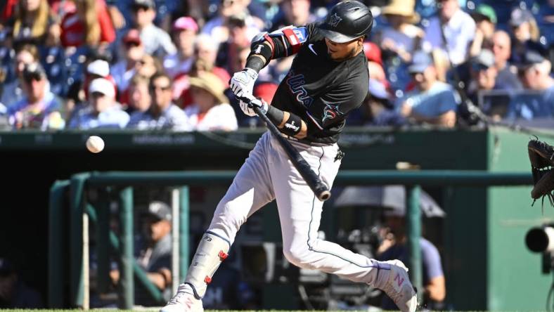 Sep 2, 2023; Washington, District of Columbia, USA; Miami Marlins second baseman Luis Arraez (3) hits a RBI single against the Washington Nationals during the second inning at Nationals Park. Mandatory Credit: Brad Mills-USA TODAY Sports