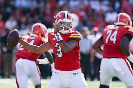 Sep 2, 2023; College Park, Maryland, USA;  Maryland Terrapins quarterback Taulia Tagovailoa (3) looks to throw as the action reflects off his visor during the first half against the Towson Tigers  at SECU Stadium. Mandatory Credit: Tommy Gilligan-USA TODAY Sports