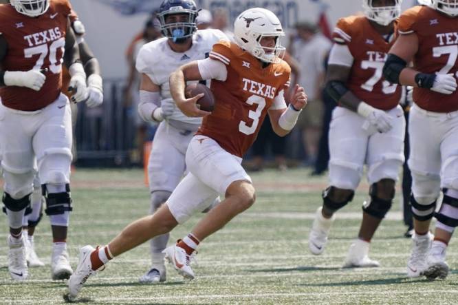 Sep 2, 2023; Austin, Texas, USA; Texas Longhorns quarterback Quinn Ewers (3) keeps the ball for yardage during the first half against the Rice Owls at Darrell K Royal-Texas Memorial Stadium. Mandatory Credit: Scott Wachter-USA TODAY Sports
