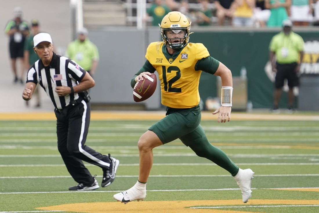 Sep 2, 2023; Waco, Texas, USA; Baylor Bears quarterback Blake Shapen (12) scrambles against the Texas State Bobcats during the first half at McLane Stadium. Mandatory Credit: Raymond Carlin III-USA TODAY Sports